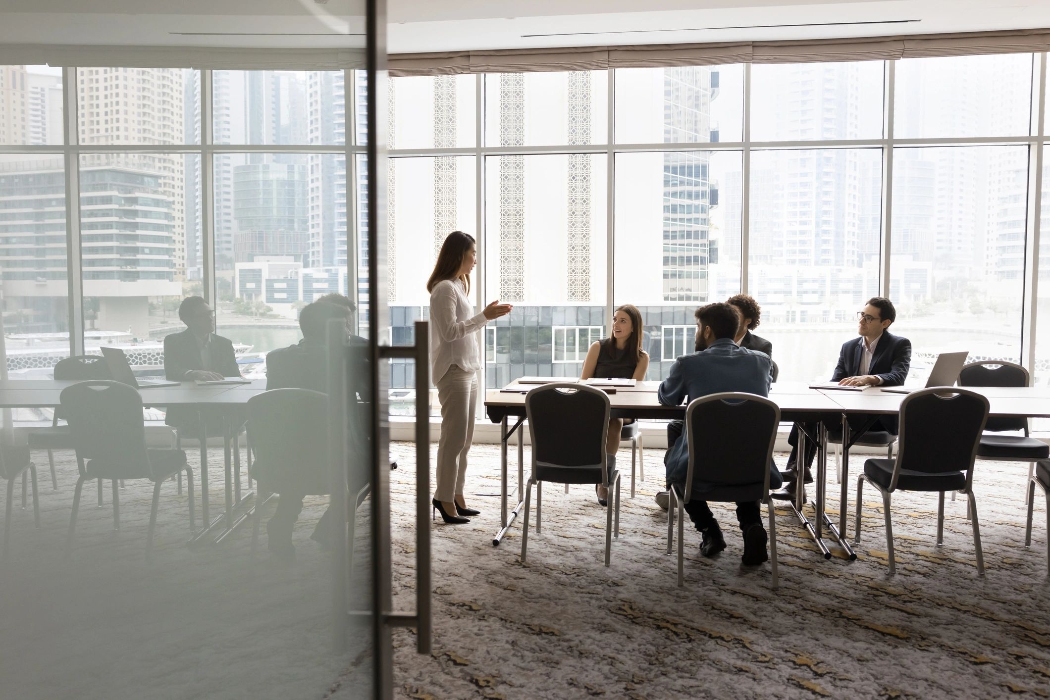 Leadership team discussing strategy in a conference room